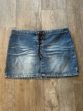 Y2K Paris Blues Denim Mini Skirt with Lace Up Front. Size: 9